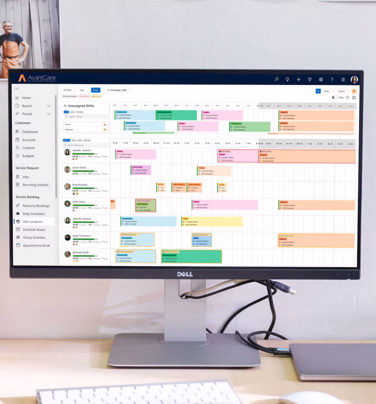 Young woman with red hair sitting on a lounge chair talking to a therapist who is taking notes.