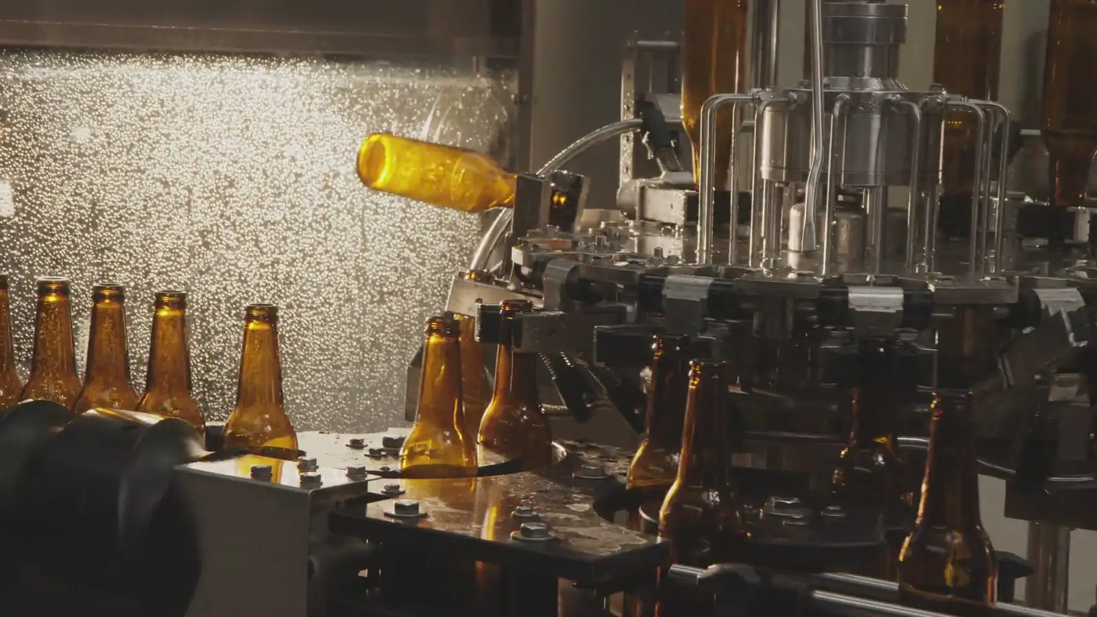 Bottles moving through a production line