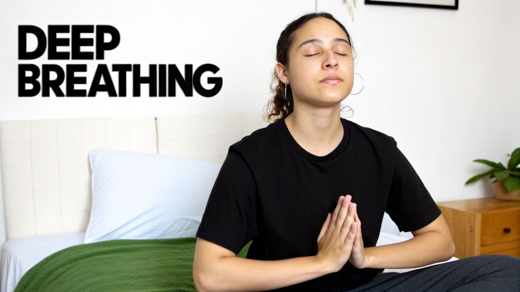 A young woman meditating with closed eyes and prayer hands in a bedroom, with "DEEP BREATHING" text.