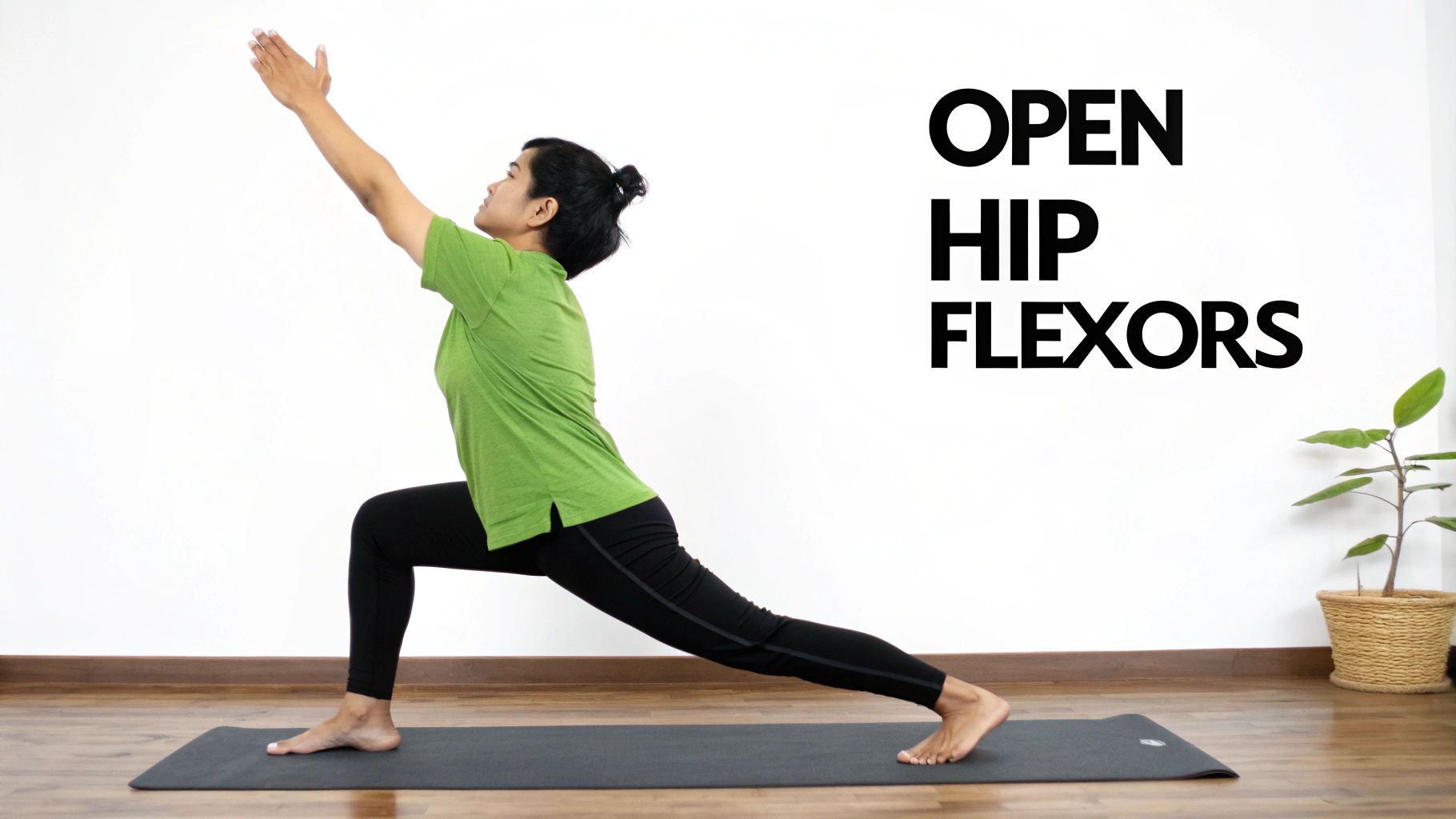 A person in a green shirt doing a high lunge yoga pose, stretching hip flexors on a mat.