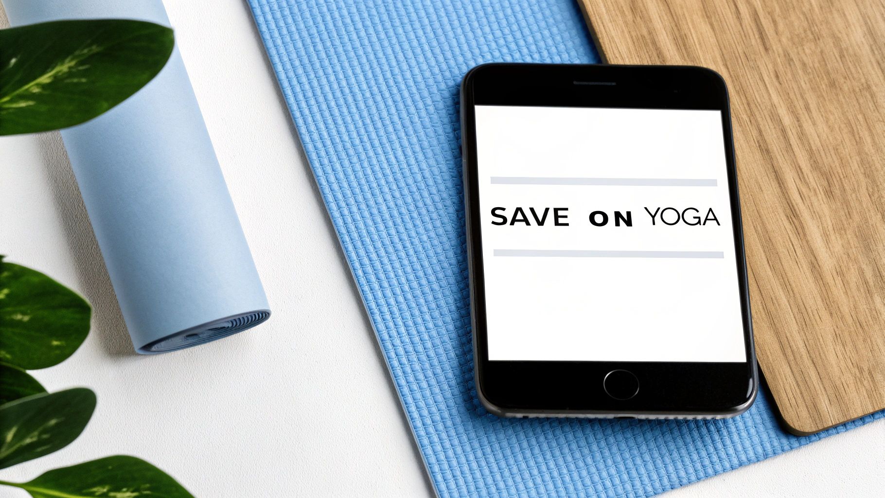 A smartphone displaying 'SAVE ON YOGA' text next to a rolled blue yoga mat on a white background.