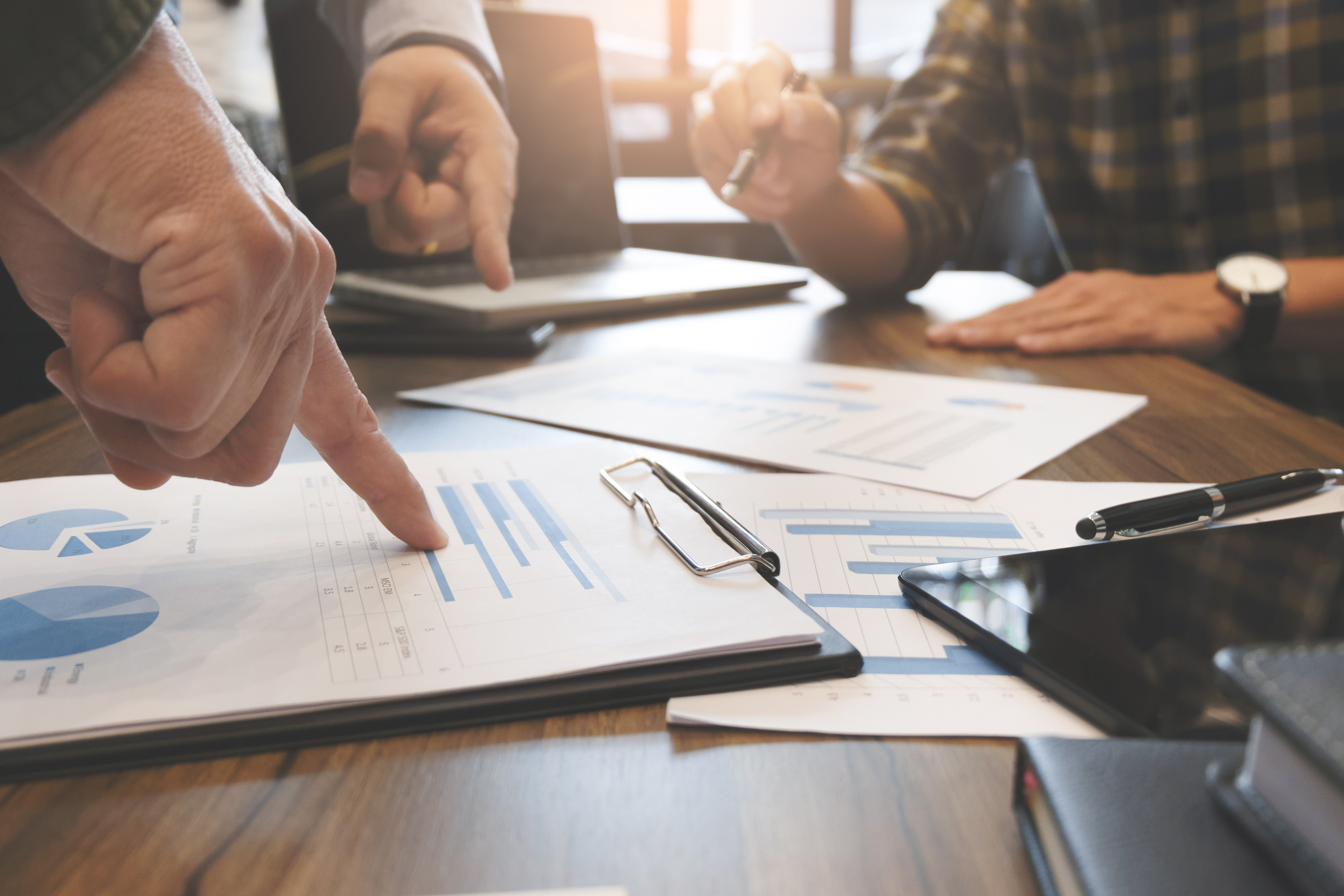 image of a teacher interacting with students using digital tools (for an edtech)