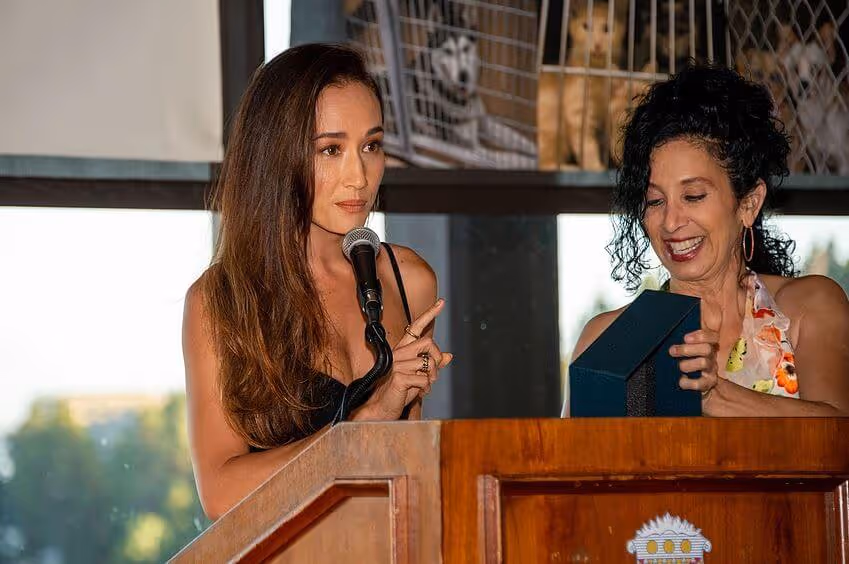 Advocate speaking at an animal rescue event in support of the campaign
