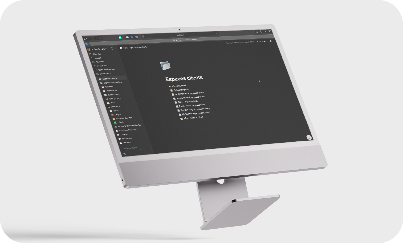 Écran d'ordinateur affichant une interface Notion avec un dossier 'Espaces clients'.