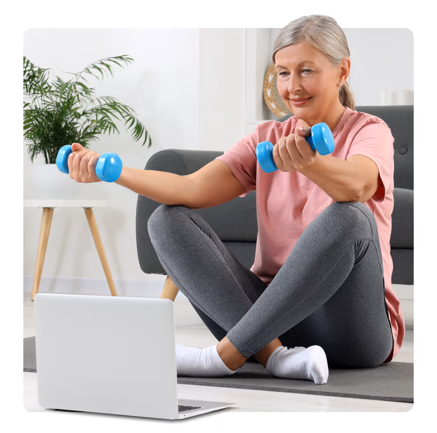 Middle-age woman working out at home
