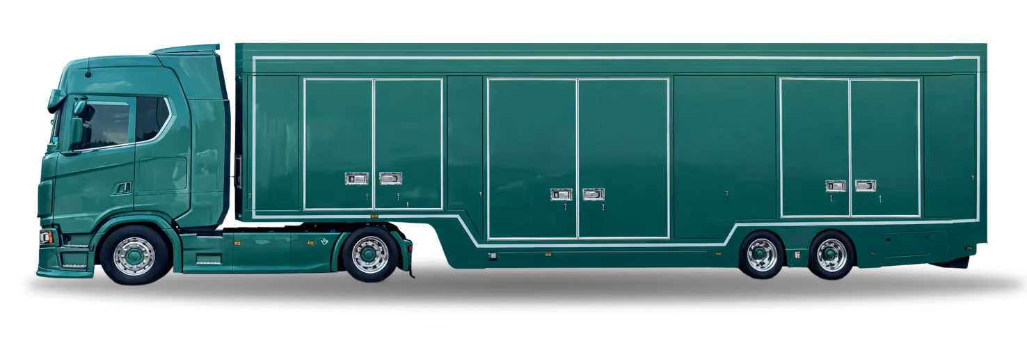Side view of a large green semi-truck with multiple storage compartments along the trailer.