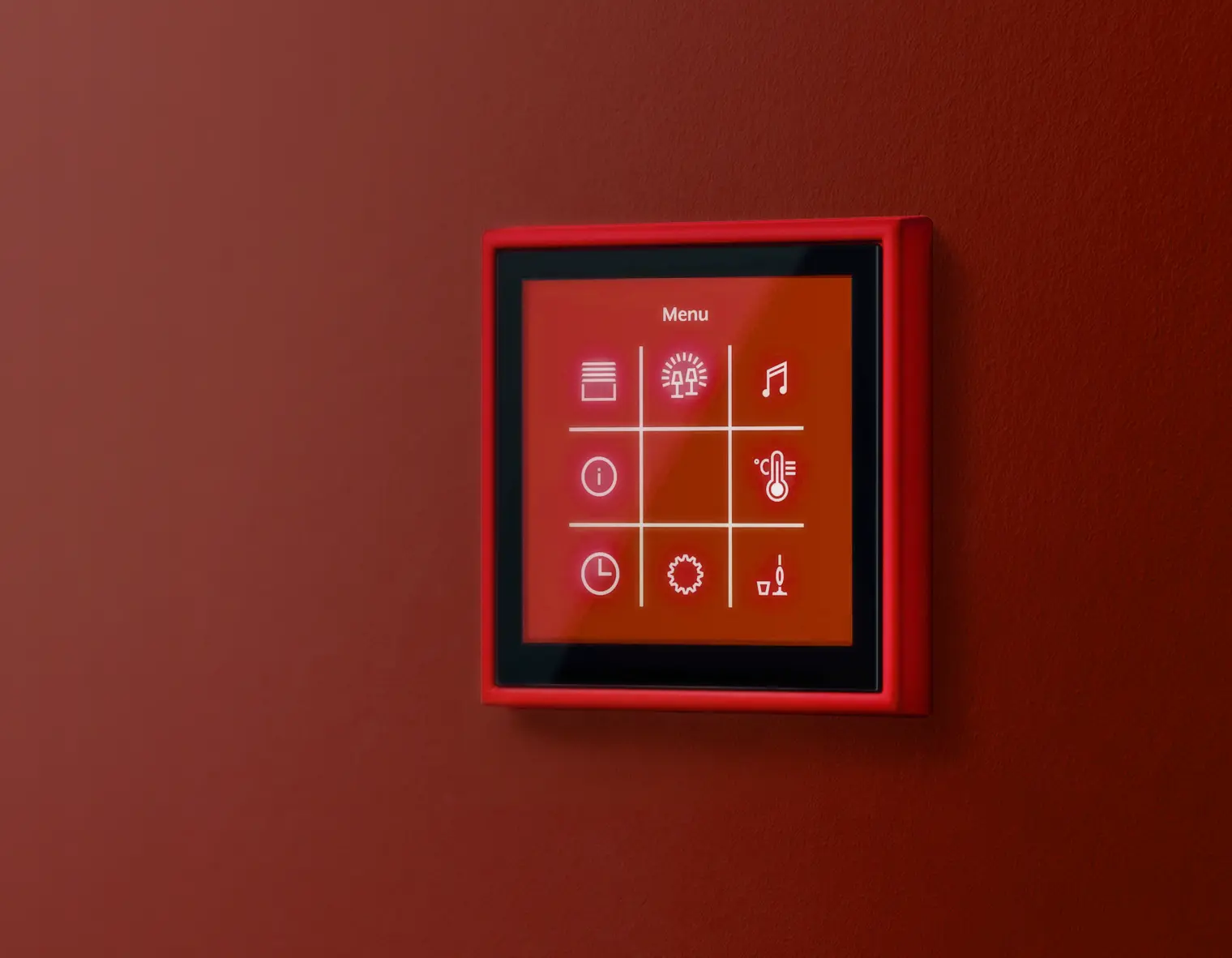 Een rode Gira LS Touch smart-home bediening, uitgevoerd in Les Coulers de Corbusier-rood (rouge vermillion 31) en gemonteerd op een rode wand