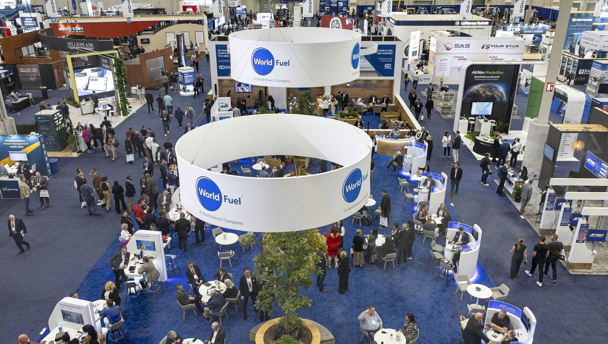NBAA-BACE attendees on a crowded exhibit floor