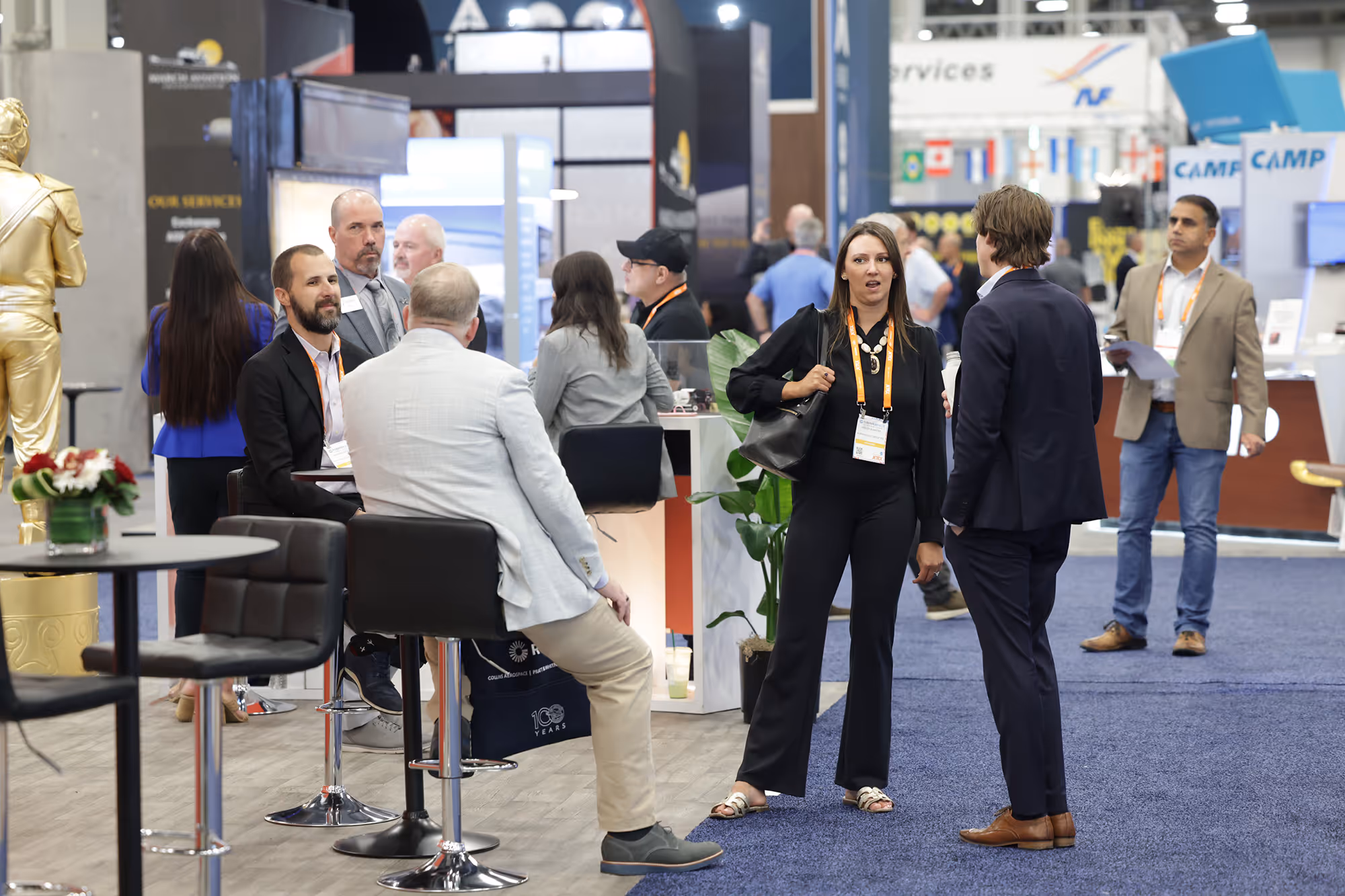NBAA-BACE attendees on a crowded exhibit floor