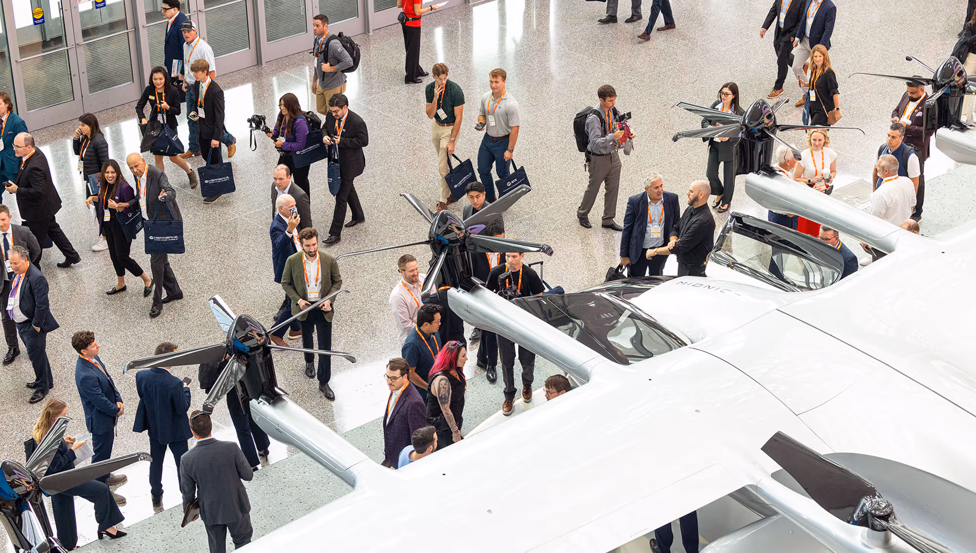 Crowds enter the LVCC at the 2025 NBAA-BACE