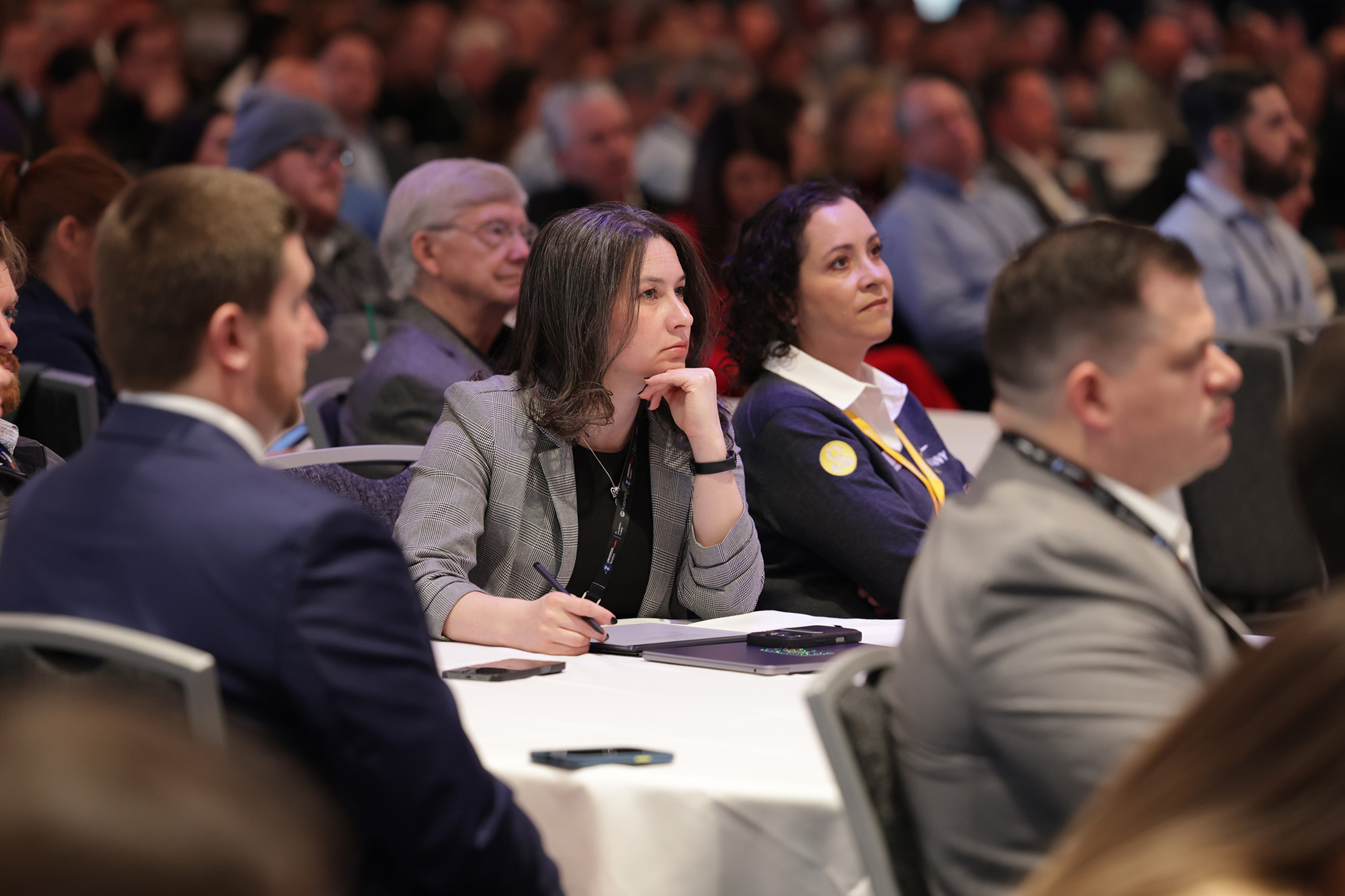NBAA-BACE attendees on a crowded exhibit floor
