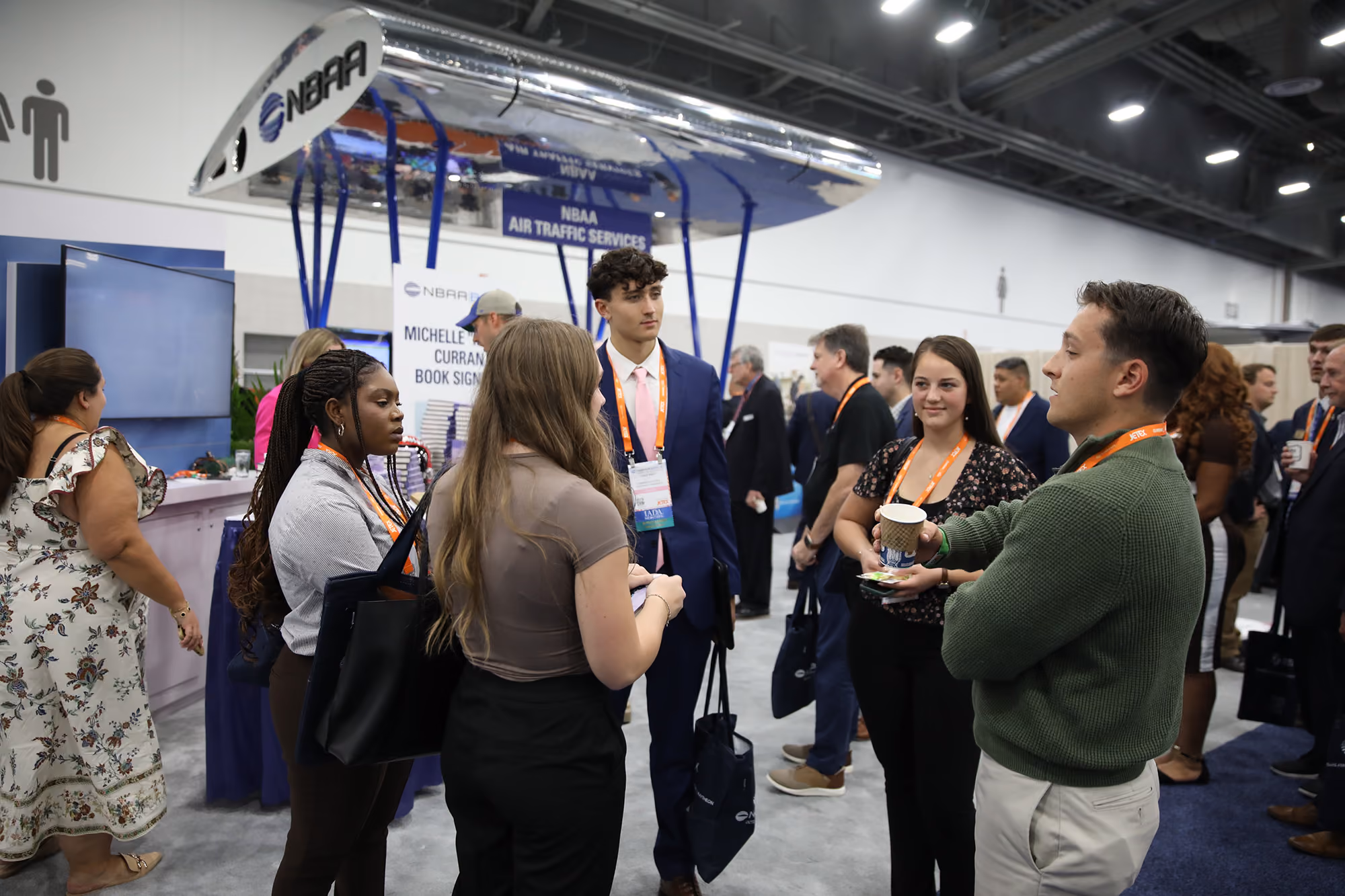 Attendees interacting at the 2025 NBAA-BACE Coffee Social