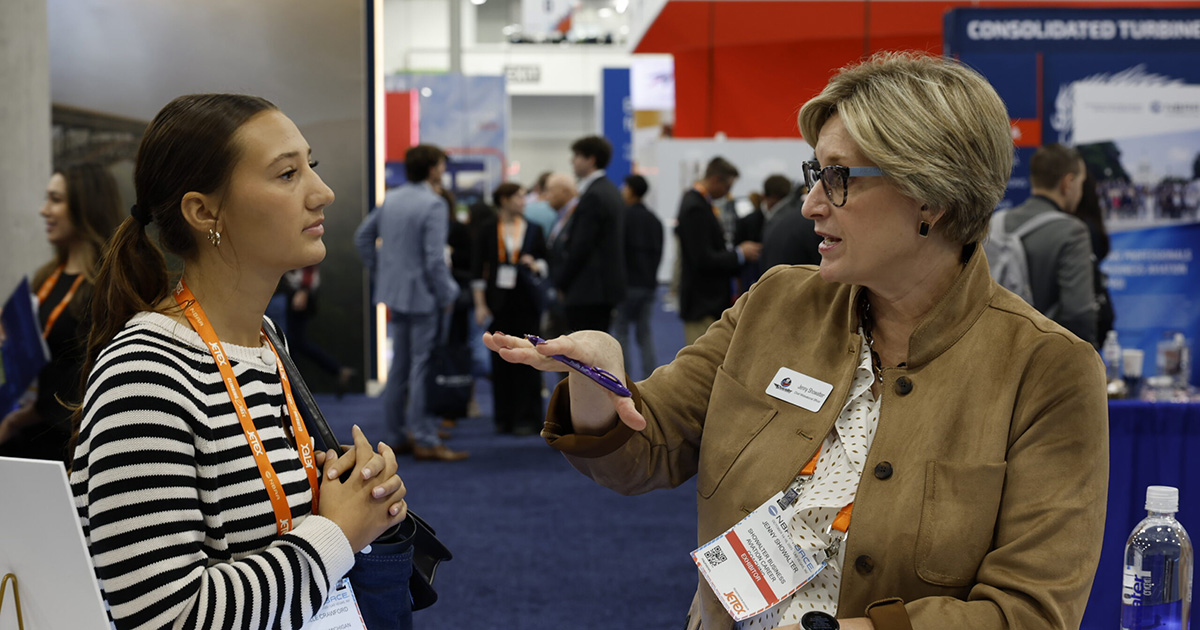 Two women talking at the 2025 NBAA-BACE Career Zone