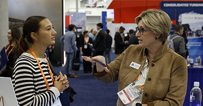 Two women talking at the 2025 NBAA-BACE Career Zone