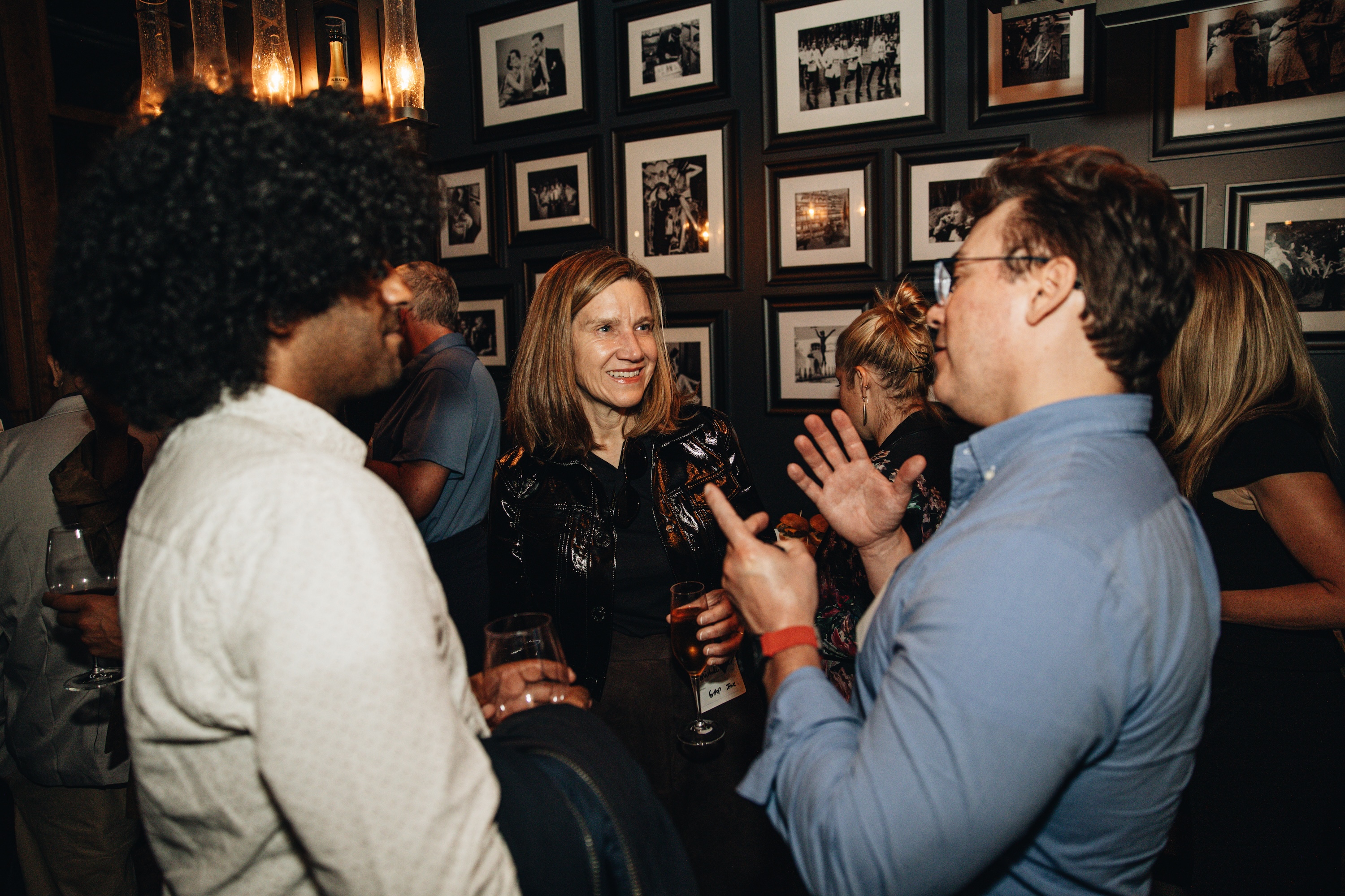 Woman smiles at a party
