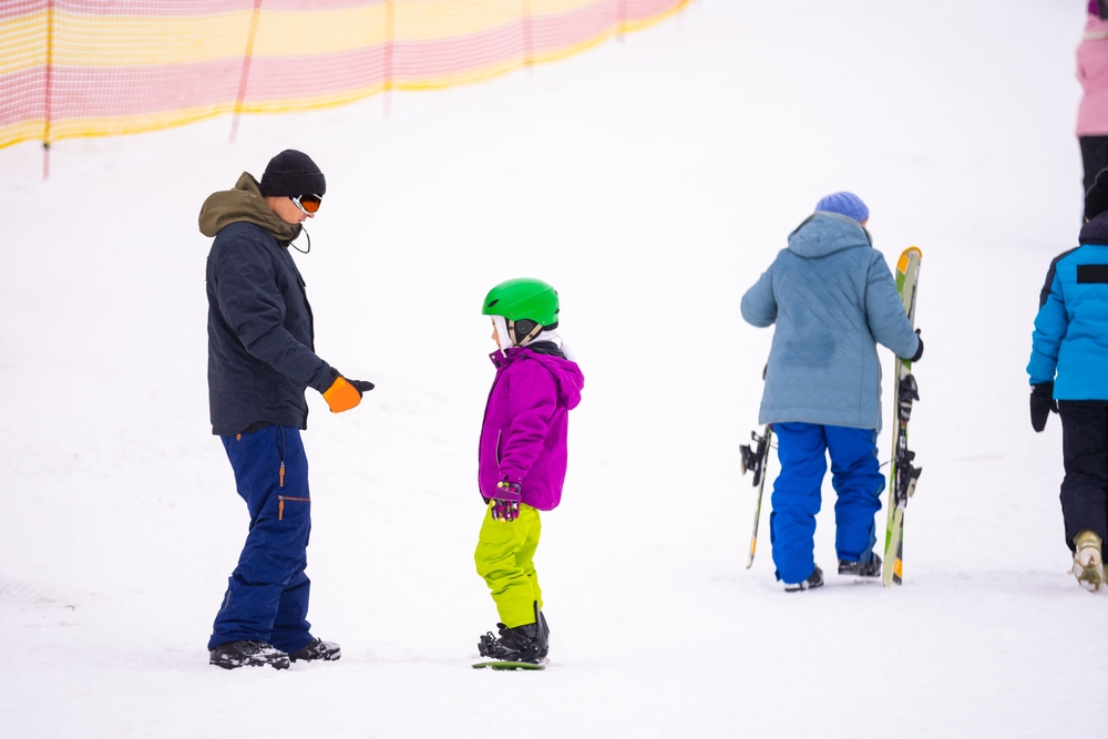 Learning with a snowboarding instructor