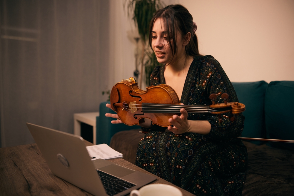 Learning with a violin teacher