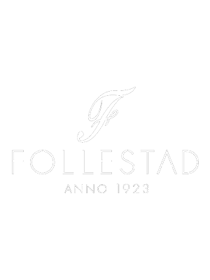 Follestad merke med årstallet 1923 under navnet på grønn bakgrunn.