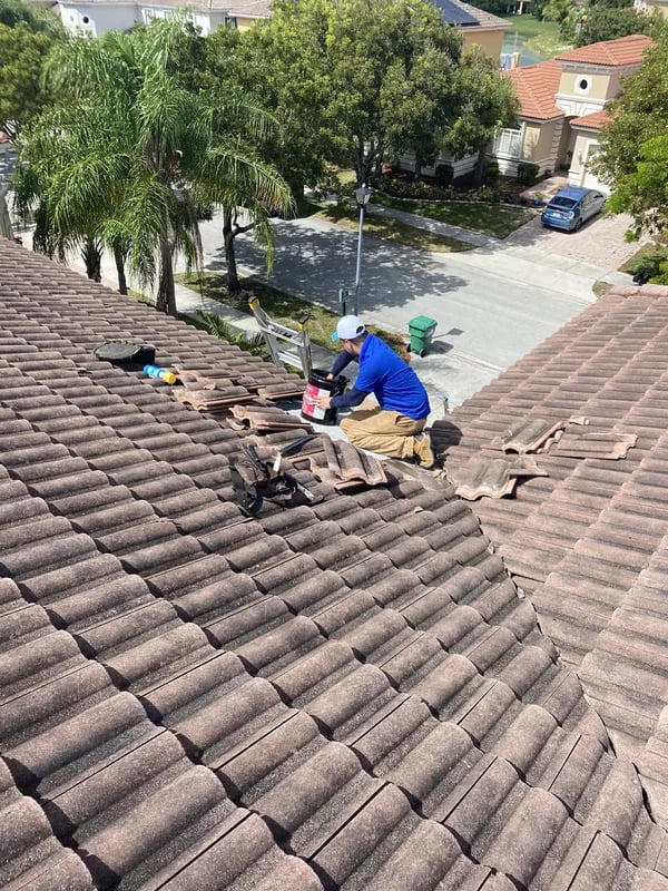 Roof damage inspection identifying needed repairs in Miami