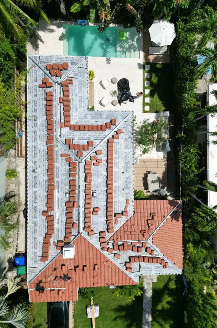 Indigo Roofing Miami team working on a residential roof in South Florida