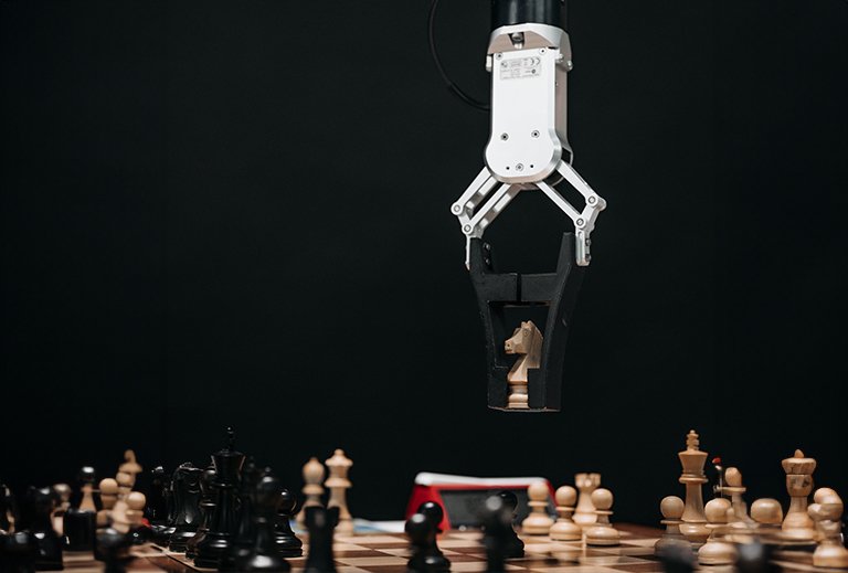 A robot arm playing chess