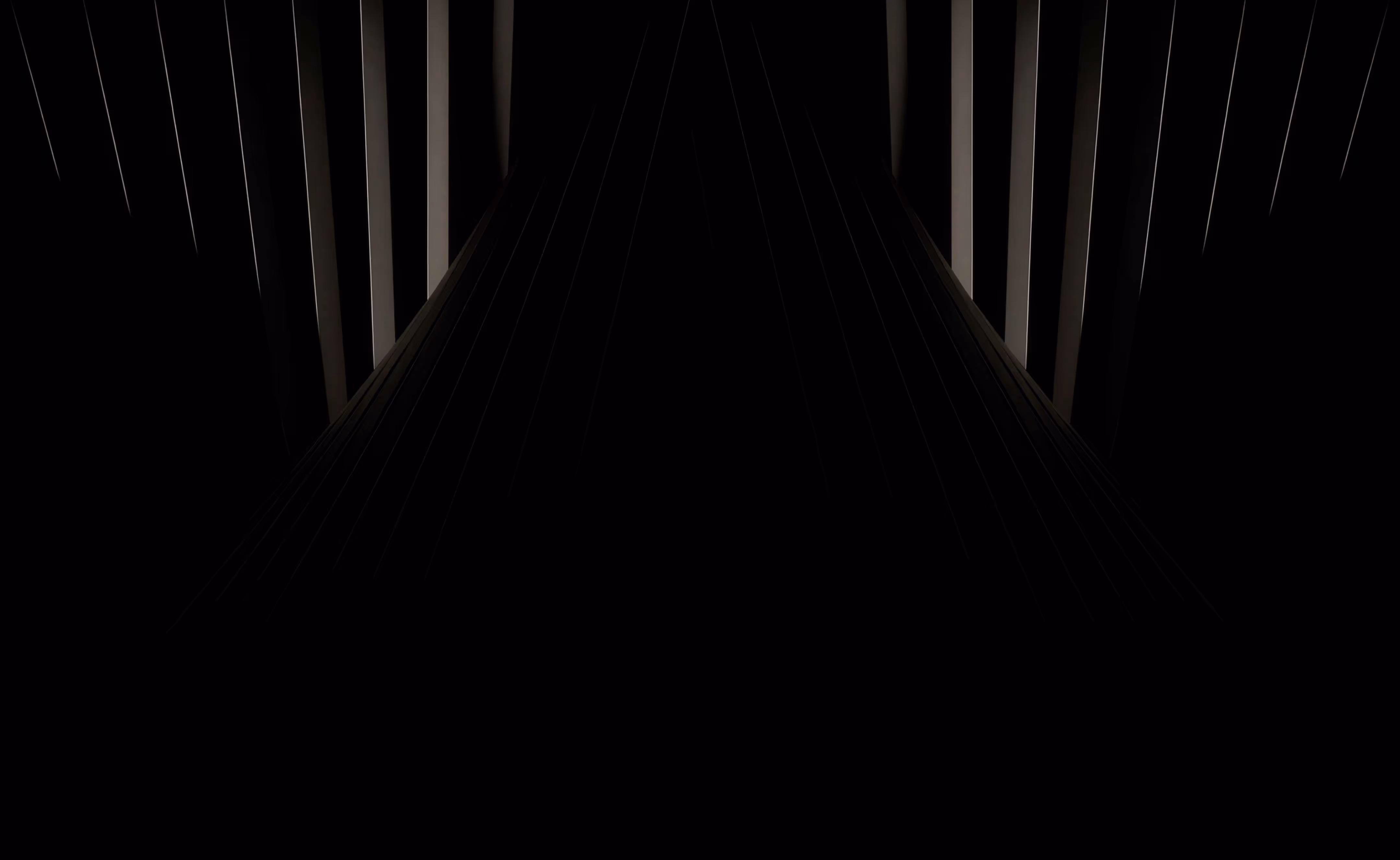 Abstract symmetrical dark geometric shapes with vertical illuminated slats fading into black.