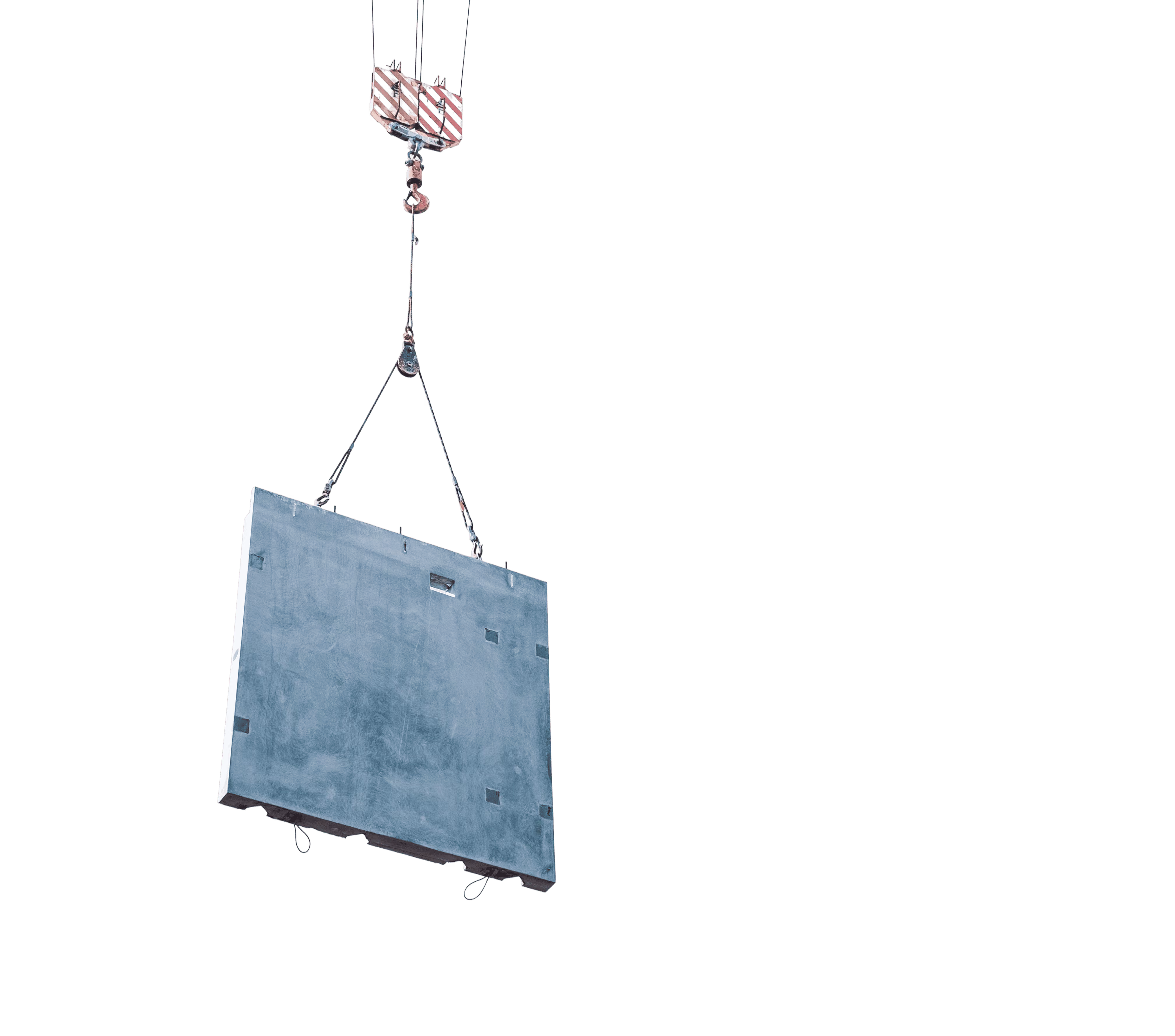A large concrete panel is lifted by cables attached to a crane hook.