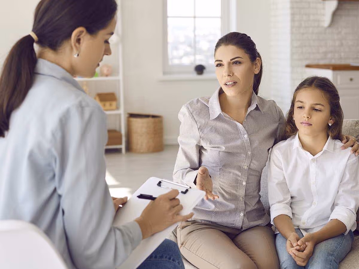 Therapist working with family