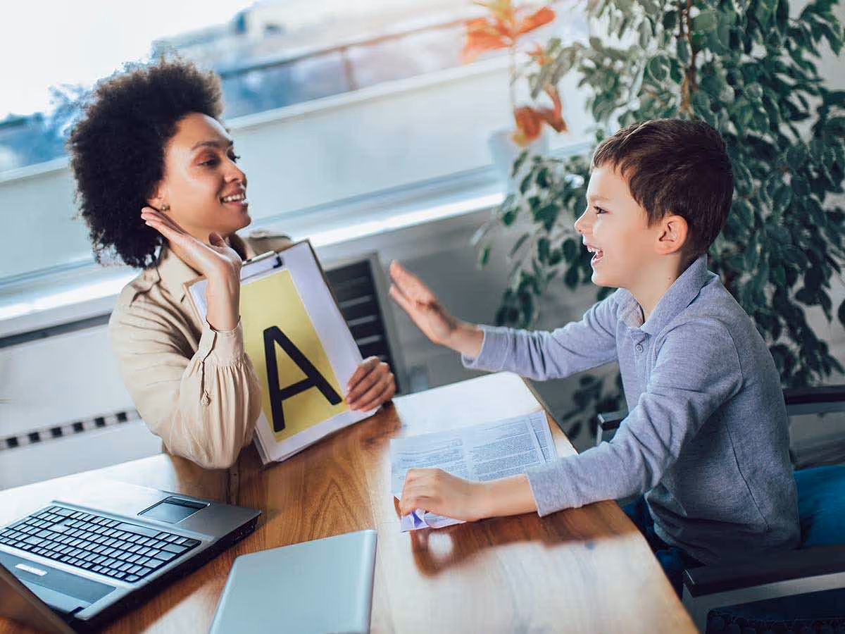Therapist working with child