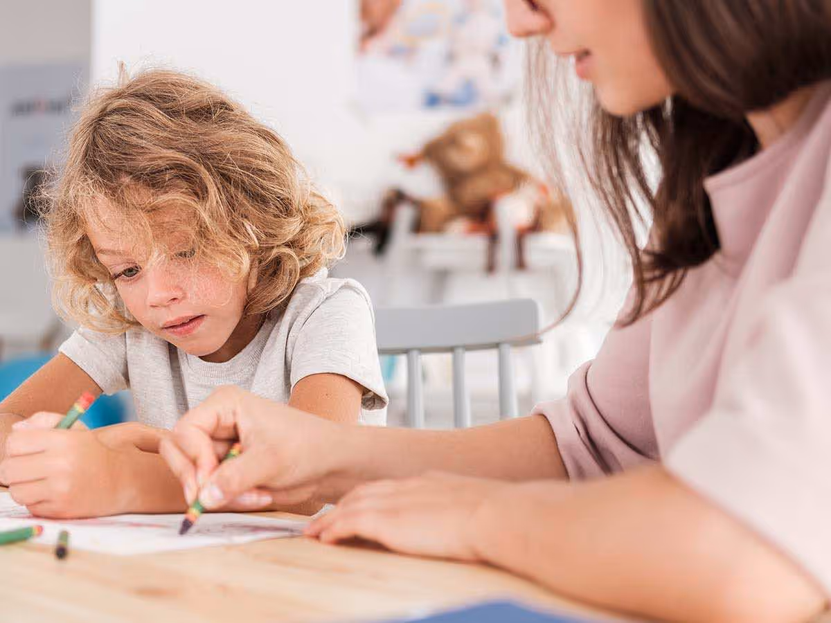 Therapist working with child