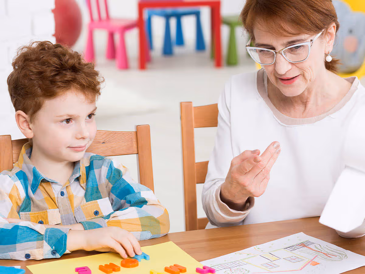 a child working with a therapist
