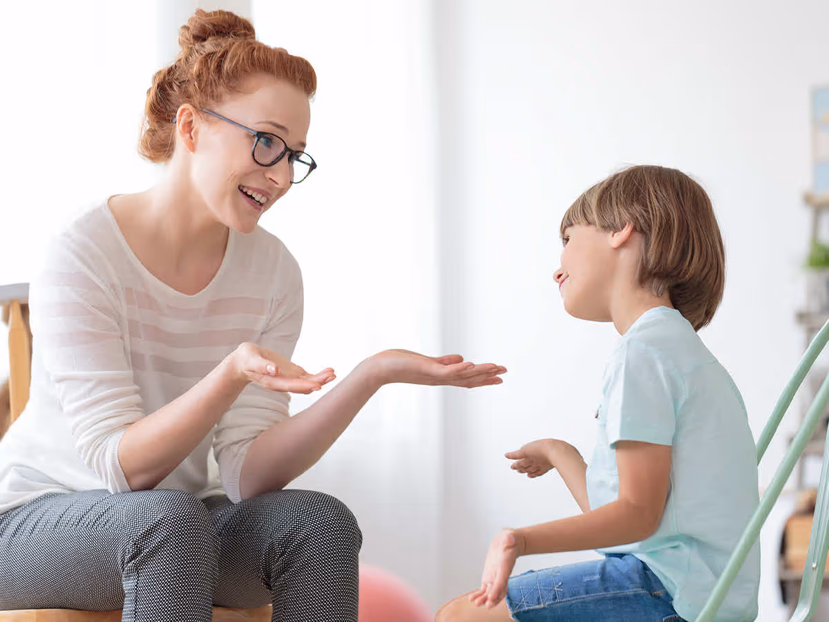 therapist working with autistic child