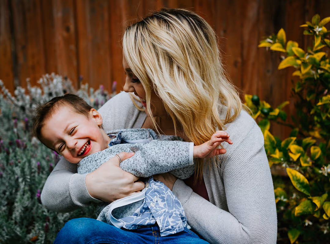 mom hugging son