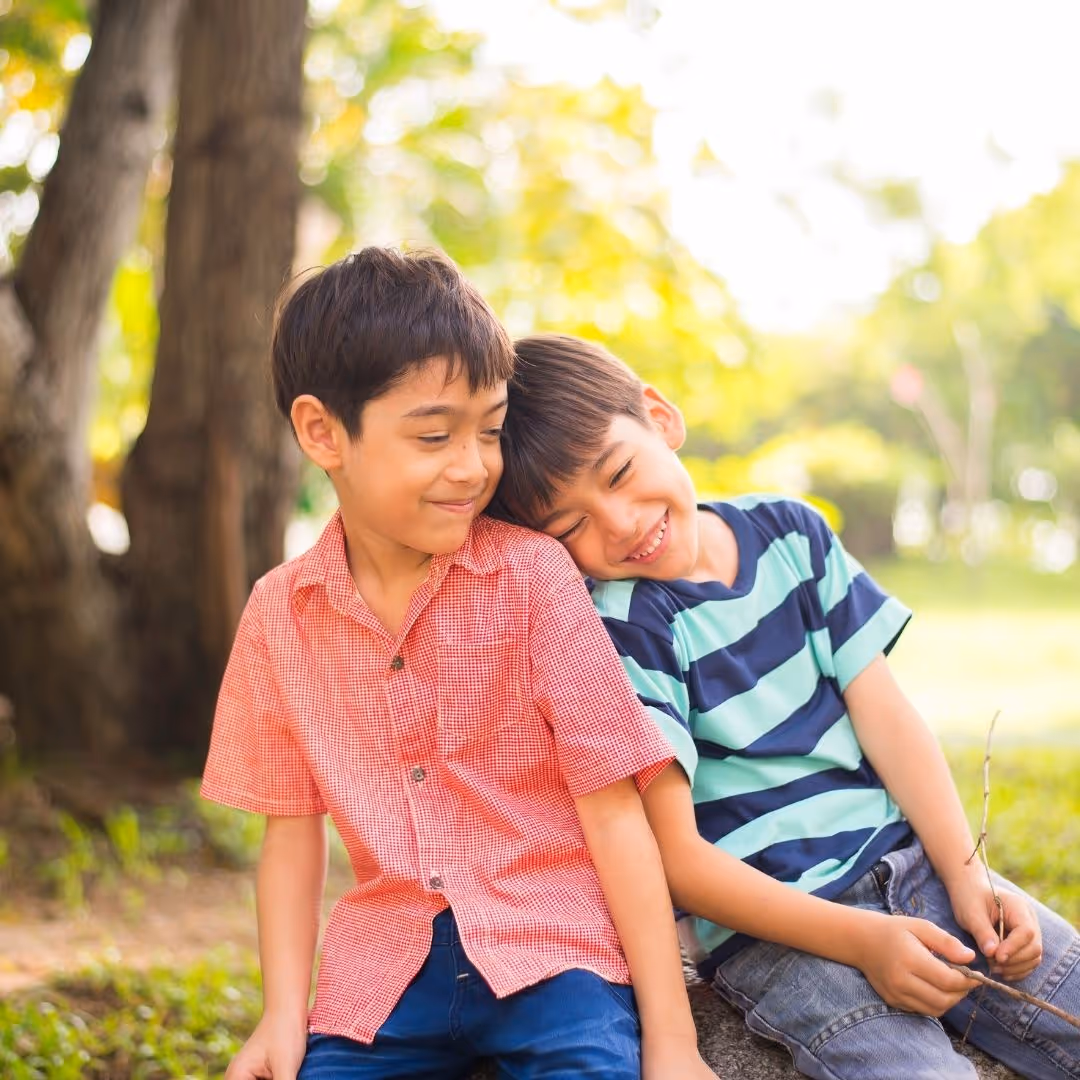 two brothers leaning on each other