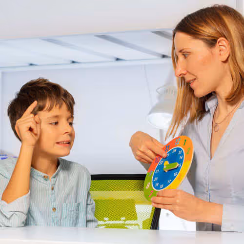 kid working with therapist