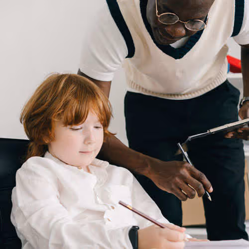 therapist working with young child