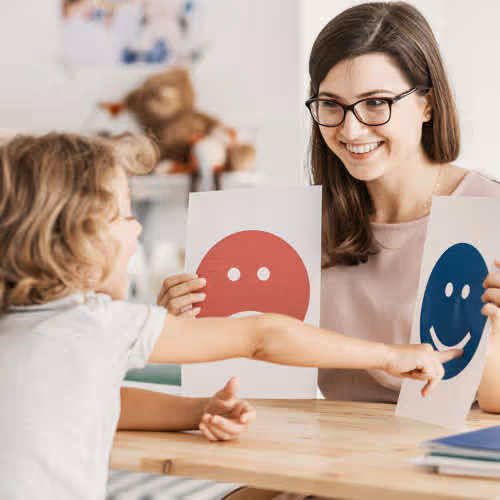 child working with therapist