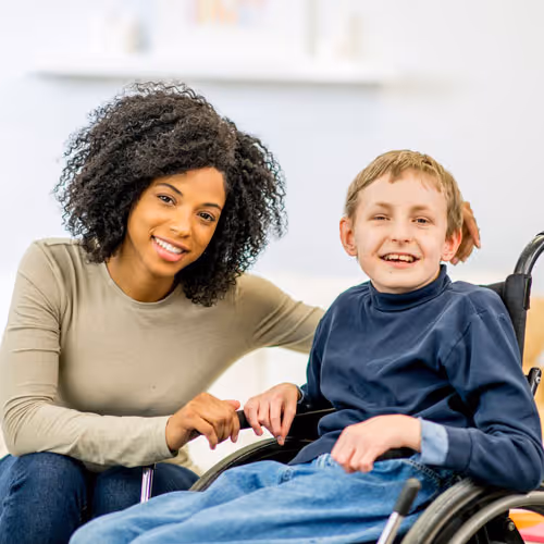 autistic child with therapist