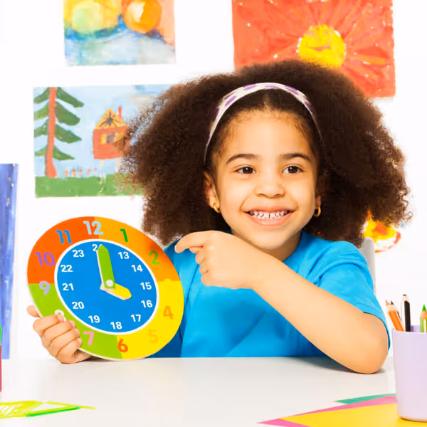 child holding clock