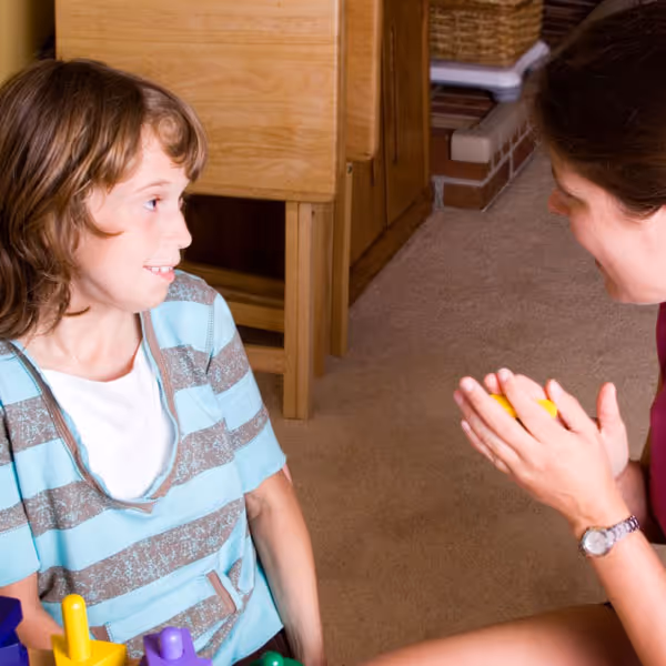 child working with therapist