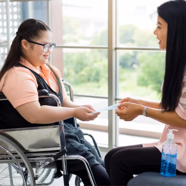child with autism working with therapist