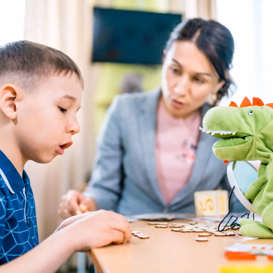 ABA therapist working with child