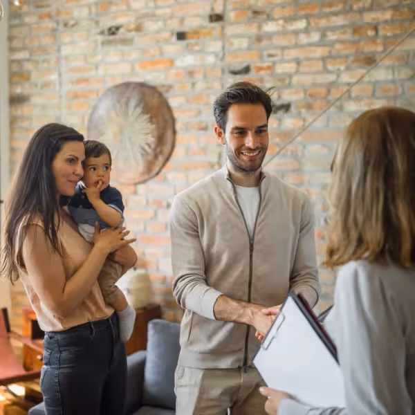 parents and child talking with therapist