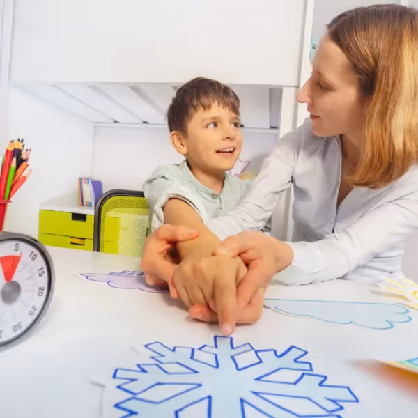 child working with therapist