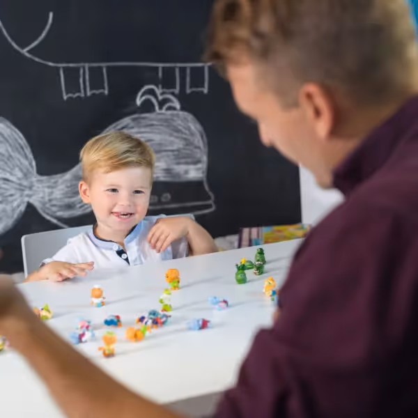 behavioral therapist working with child