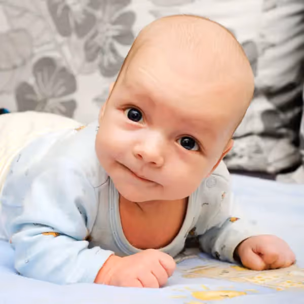 a newborn lifting its head