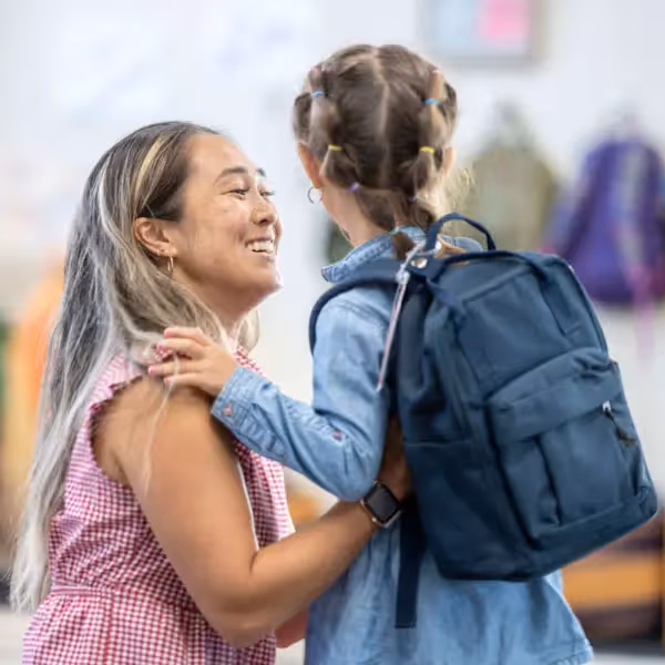 a teacher helping a student