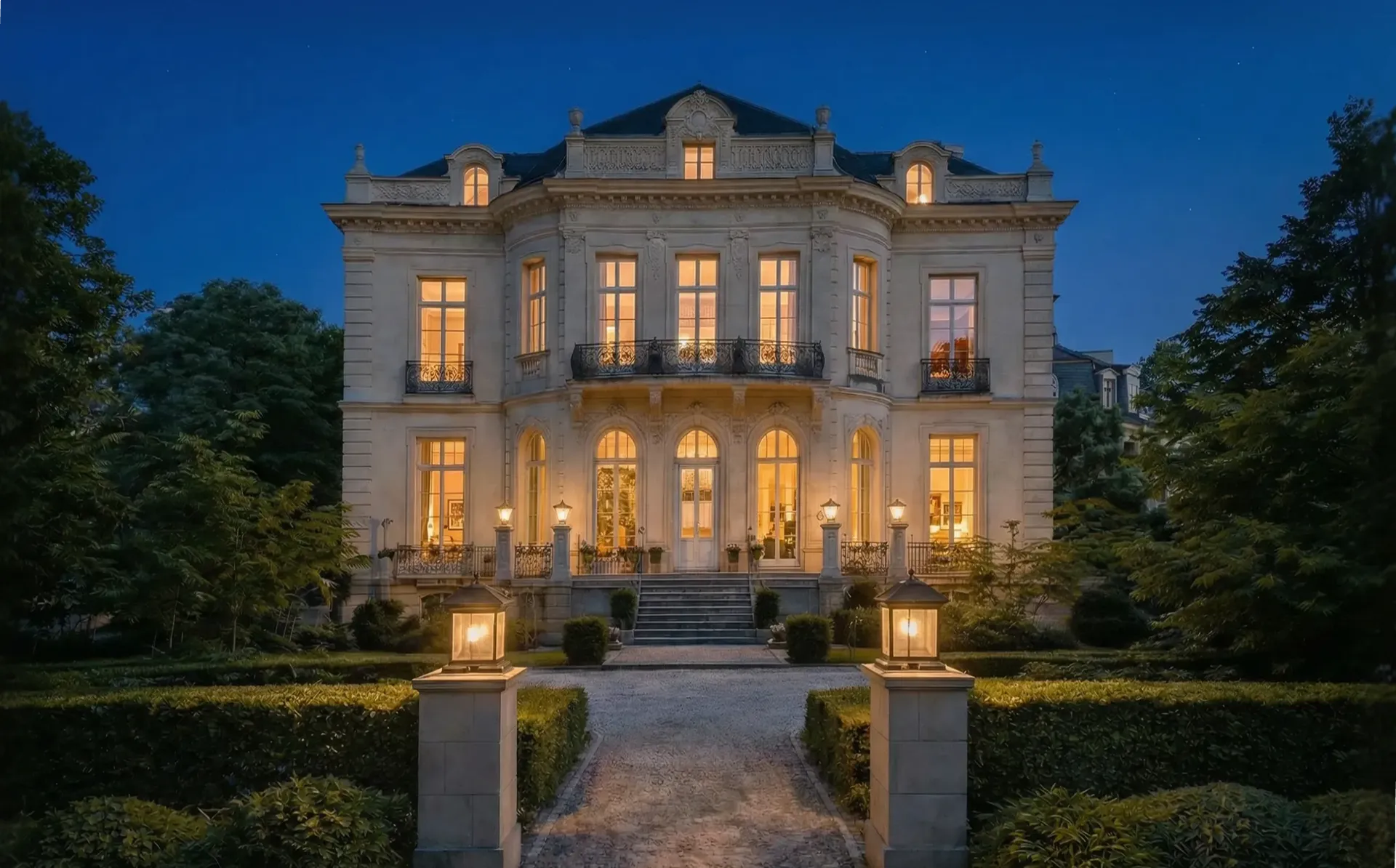 A large white house with a lot of windows.