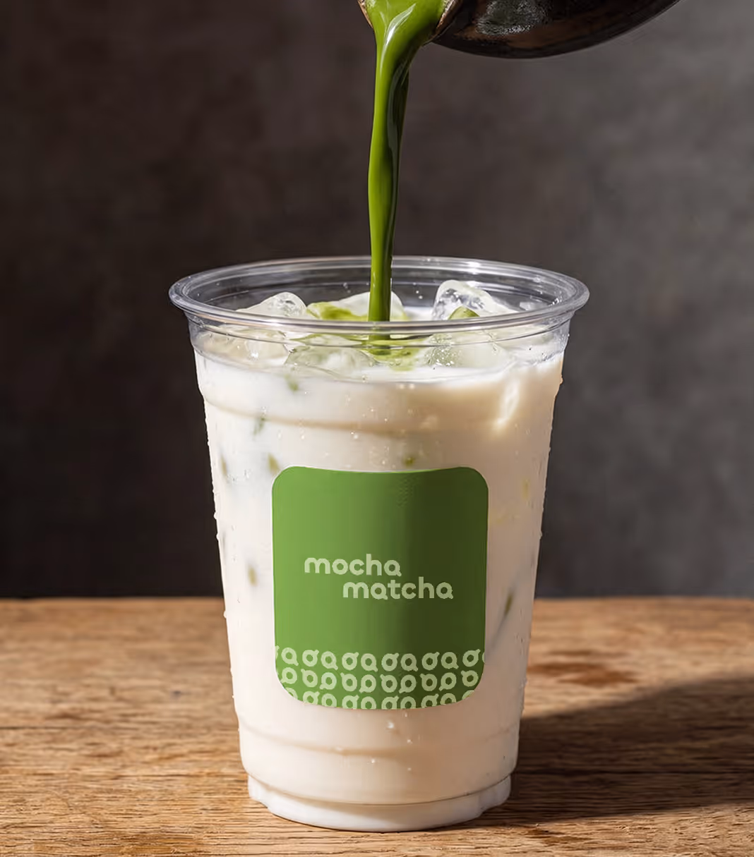 An image of pouring matcha into a cold drink cup