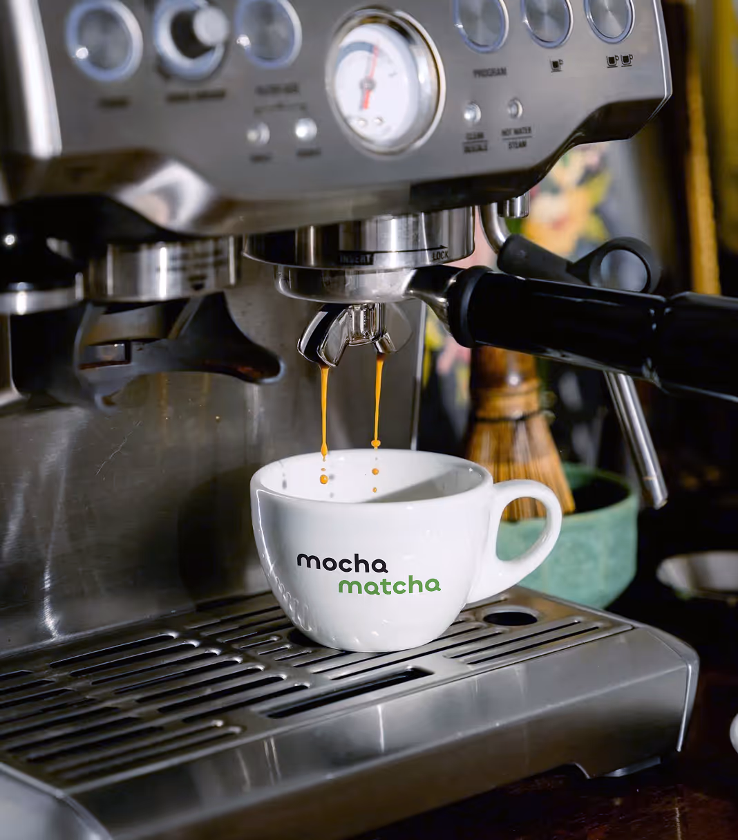 An image of espresso dropping in a tiny cup, from Stills by Zainab Jabri